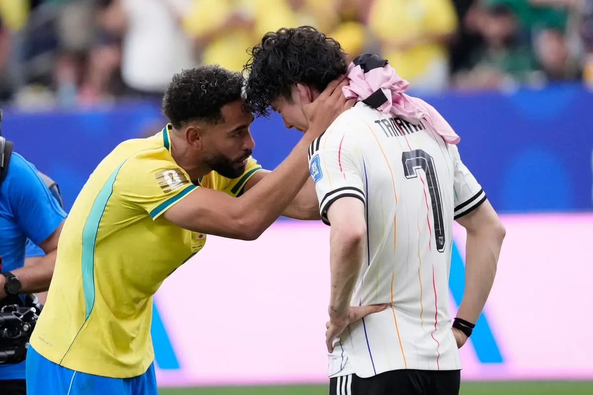 Watch viral video: Woman wraps devastated Japan fan in Brazilian flag after thrilling Round of 32 clash