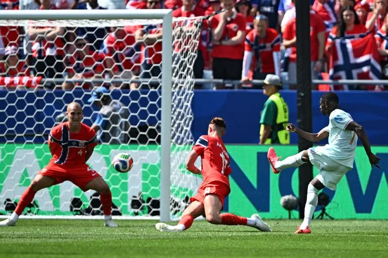 France's forward #07 Ousmane Dembele shoots and scores his team's third goal during the 2026 World Cup Group I football match between Norway and France at the Boston Stadium in Foxborough on June 26, 2026.