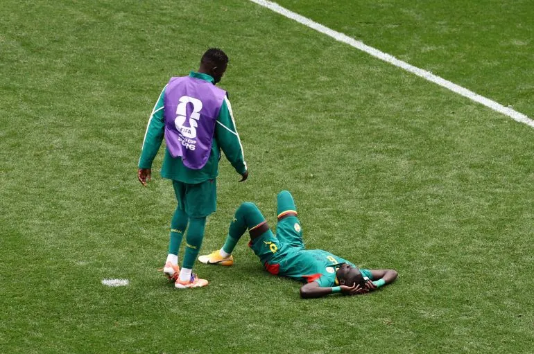 Soccer Football - FIFA World Cup 2026 - Round of 32 - Belgium v Senegal - Seattle Stadium, Seattle, Washington, U.S. - July 1, 2026 Senegal's Pathe Ciss looks dejected after the match as Senegal are eliminated from the World Cup REUTERS/Lee Smith