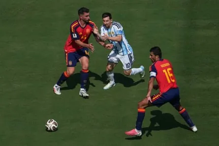 Aymeric Laporte and Rodri block off Lionel Messi.